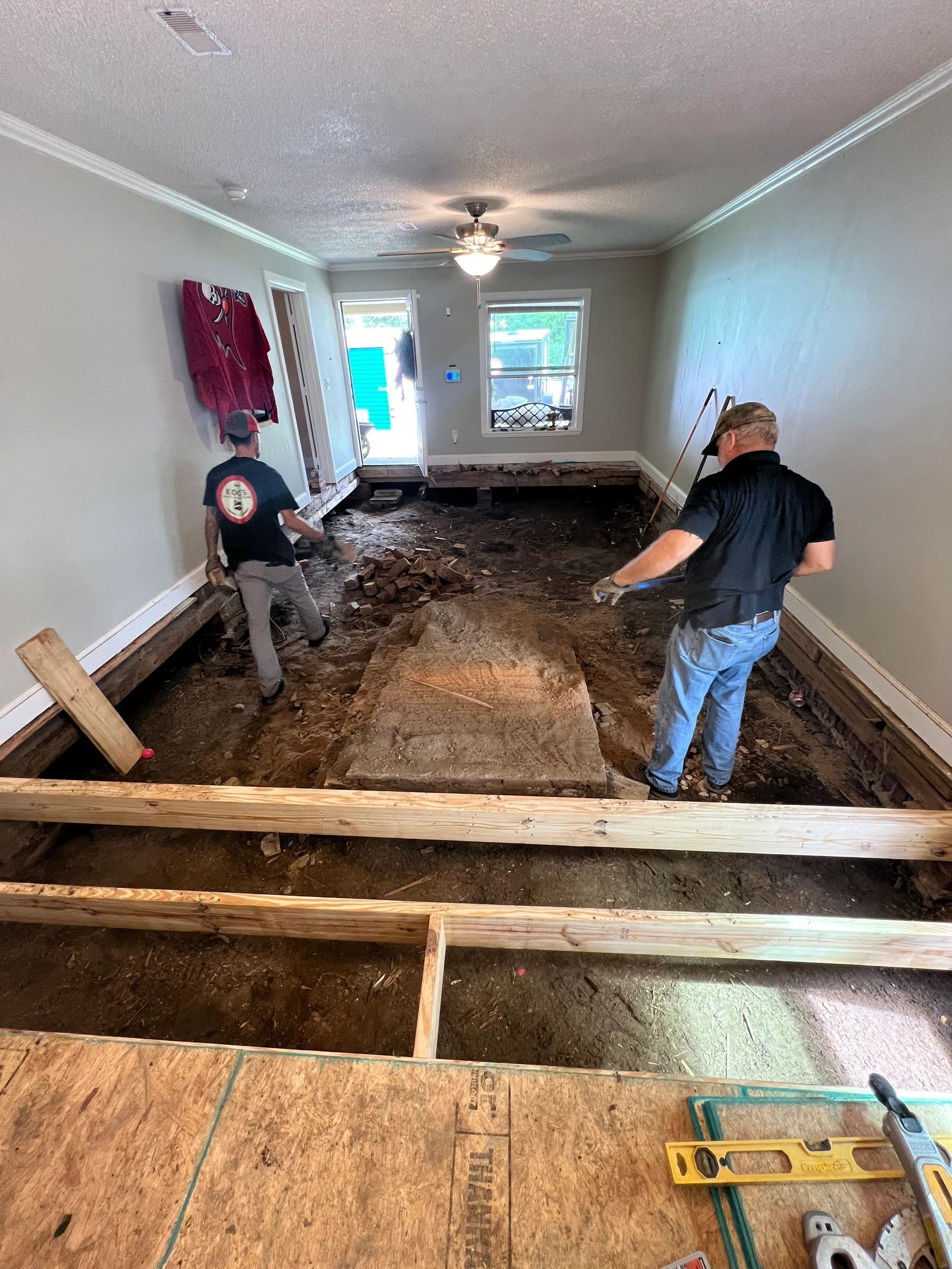 Two of the crew setting out the floor together.