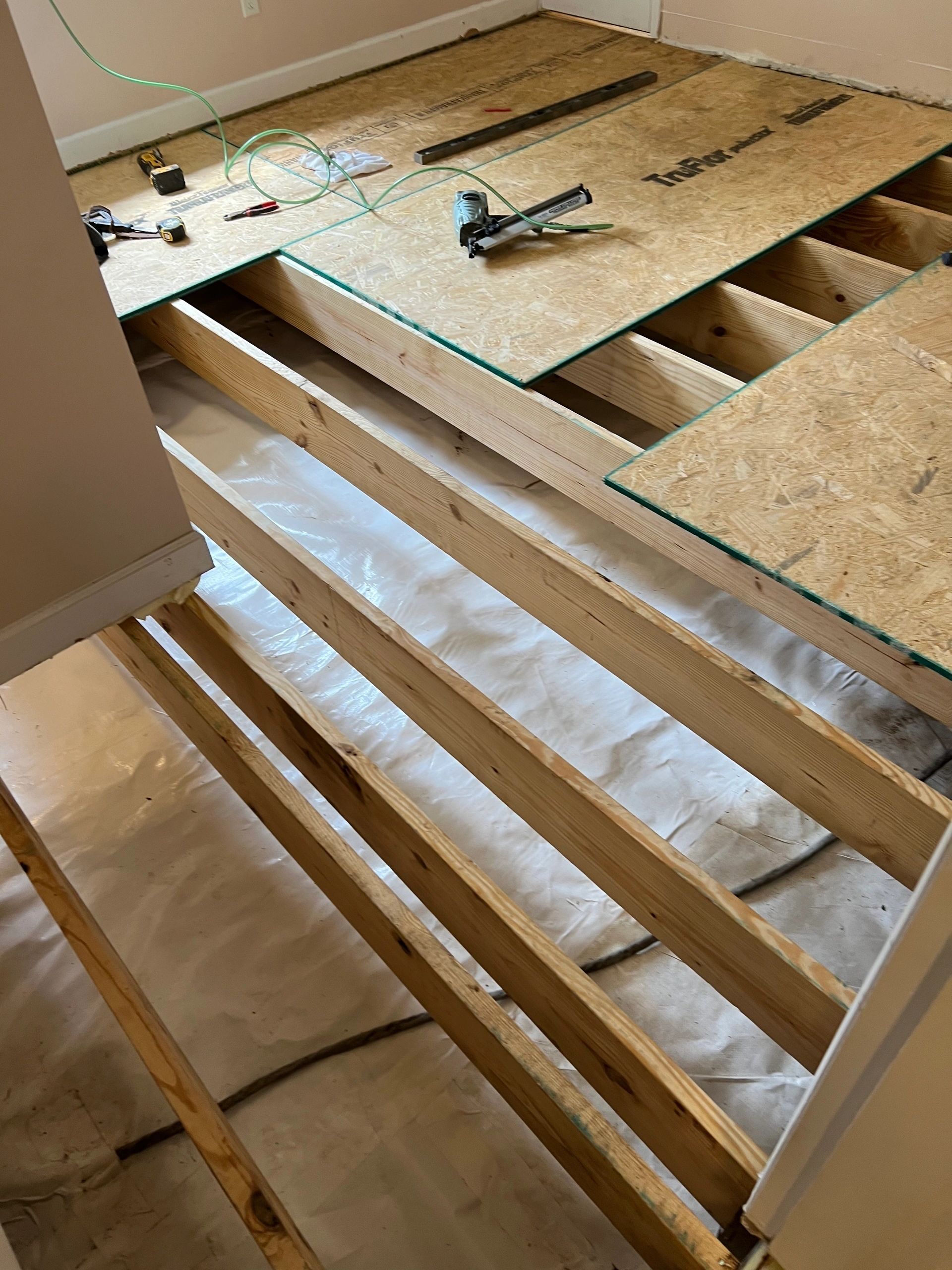 Close on the joists, sistered and set true.
